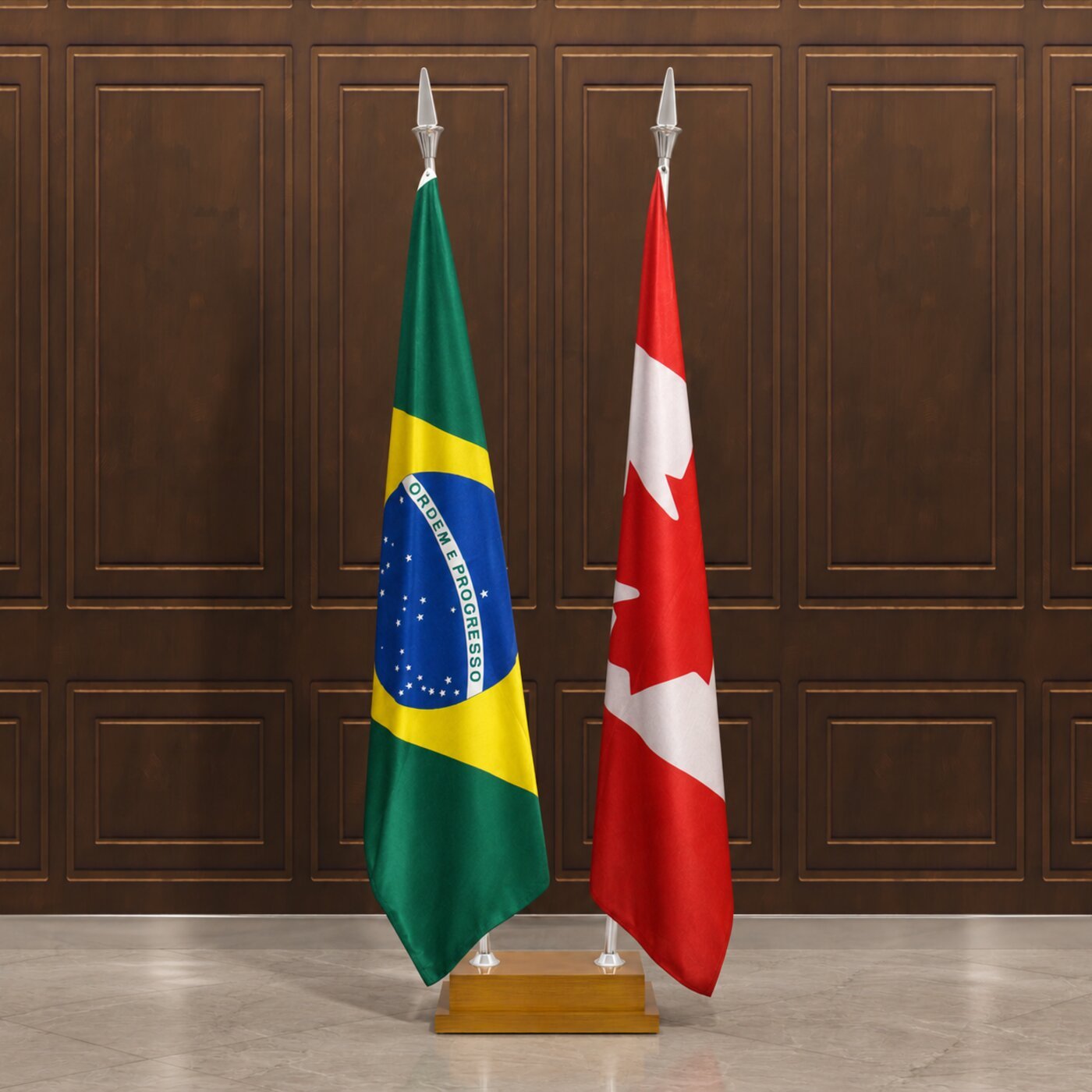 Bandeira do Brasil e do Canadá hasteadas em base de madeira, painel de madeira ao fundo